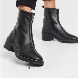 Depp chunky center zip boots in black leather
